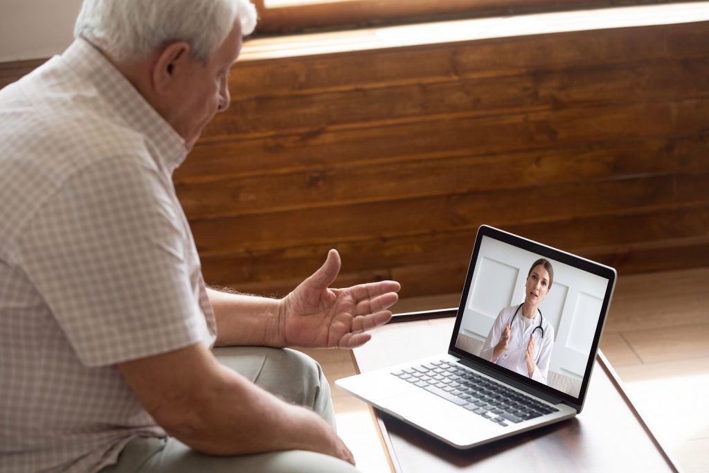 Co-creating a Virtual Community Care Hub to Support Seniors Aging at Home