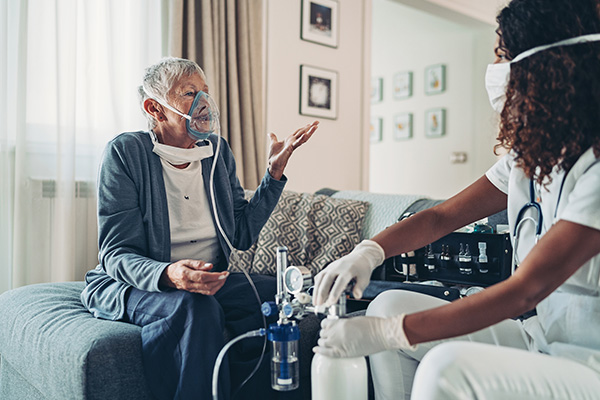 Rural-paramedic-seniors’-care-training image of elderly lady in wheelchair with oxygen mask