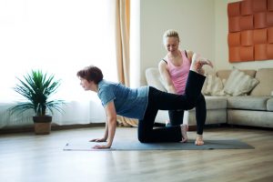 Senior exercising at home