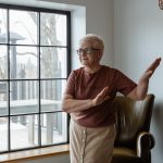 Woman dancing in her living room